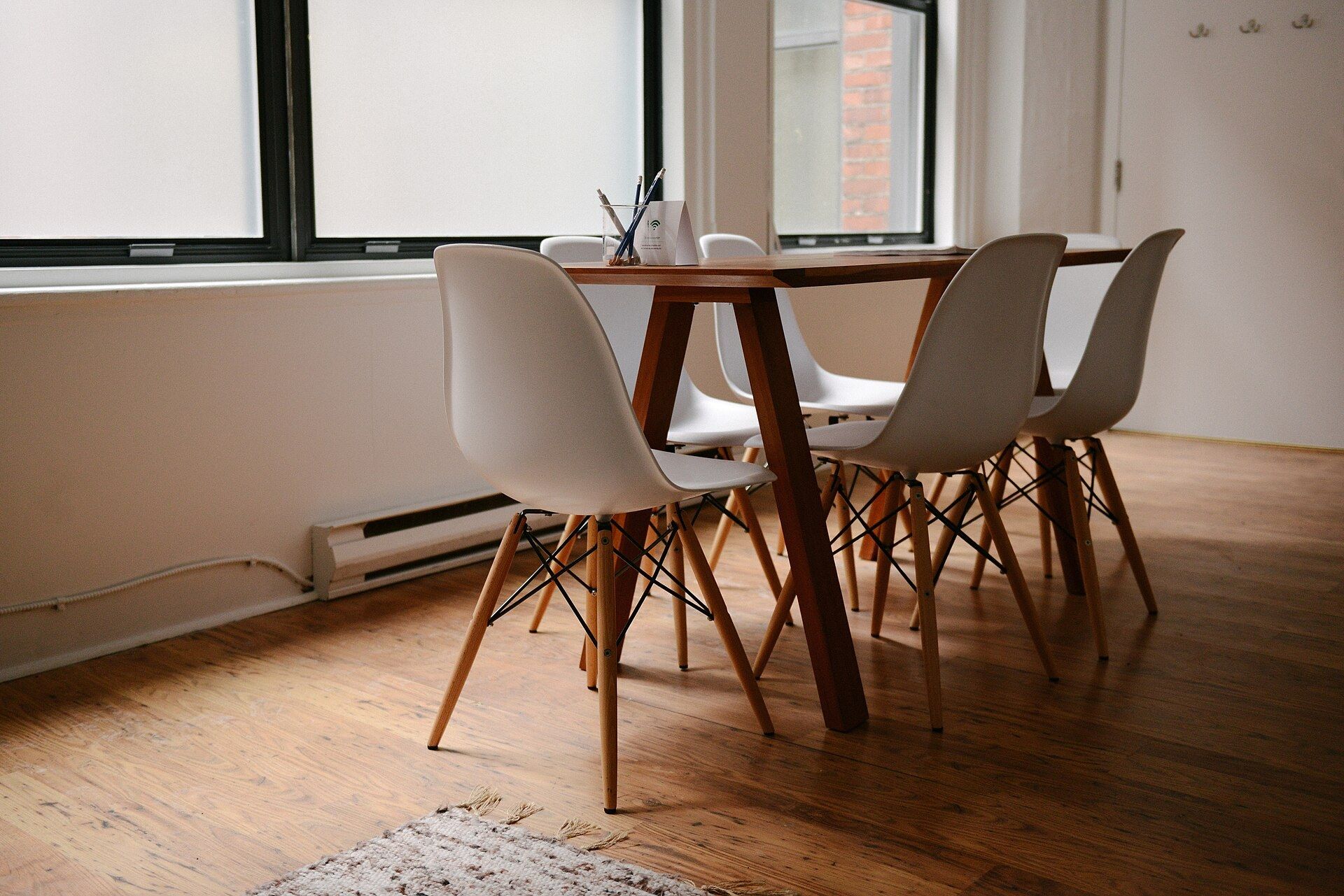 Empty chairs around a long table in a meeting room. A Wikimedia Commons photograph on Brent O'Mara Insights.