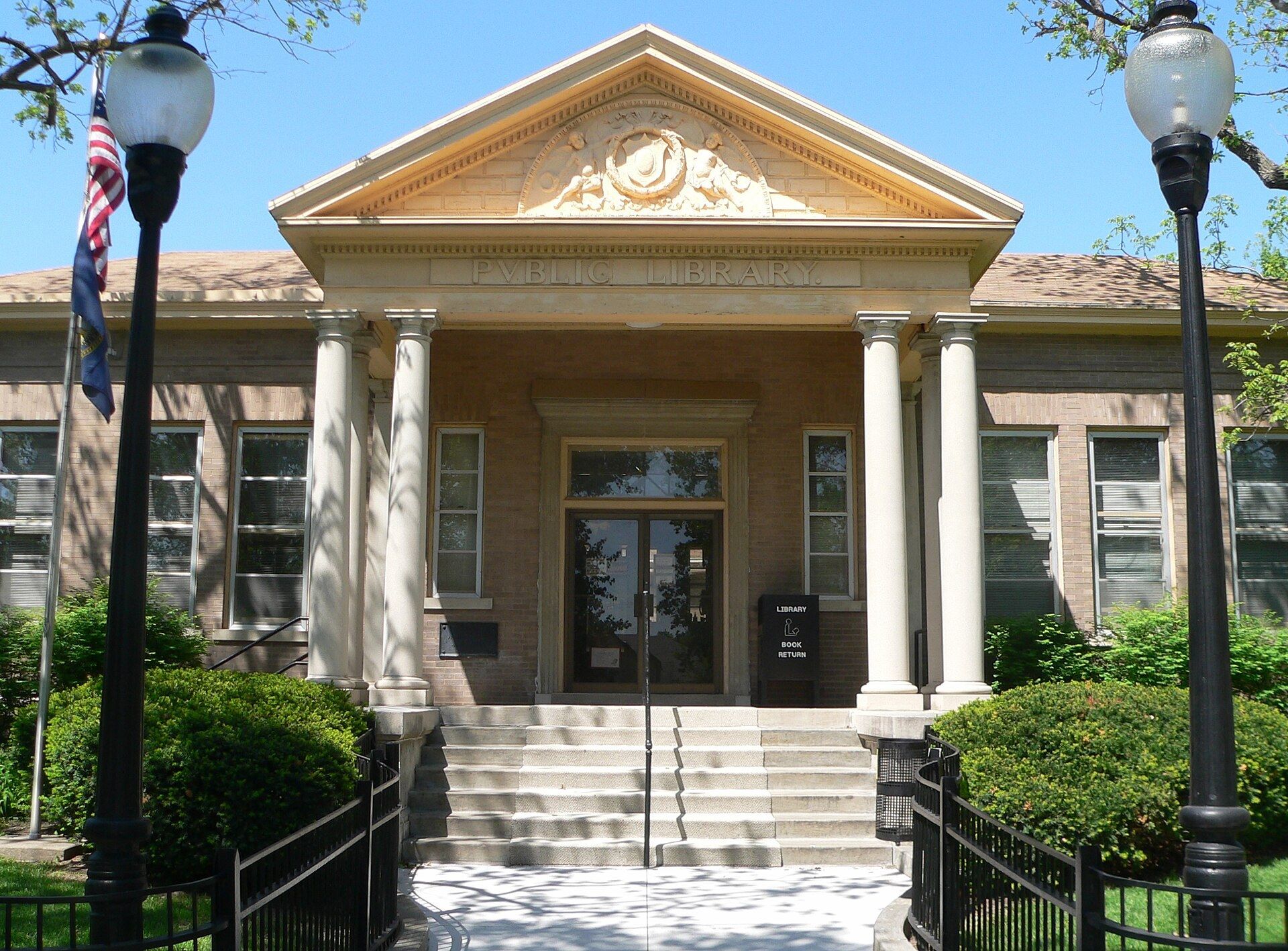 The columned entrance of a Carnegie library in a Nebraska town. A Wikimedia Commons photograph on Brent O'Mara Insights.