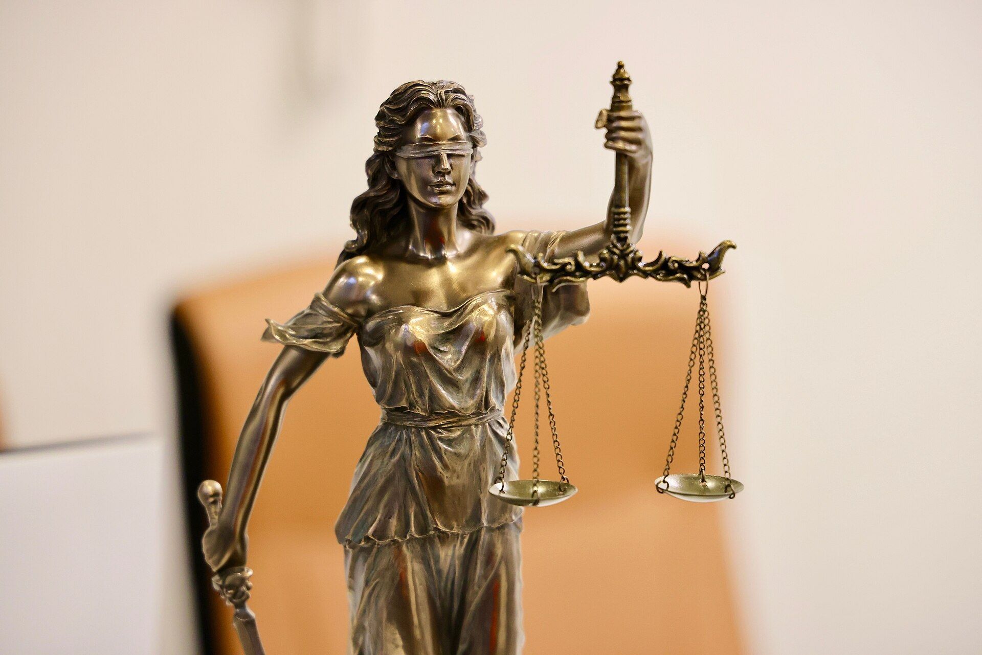 A statue of Justice holding a balance scale. A Wikimedia Commons photograph on Brent O'Mara Insights.