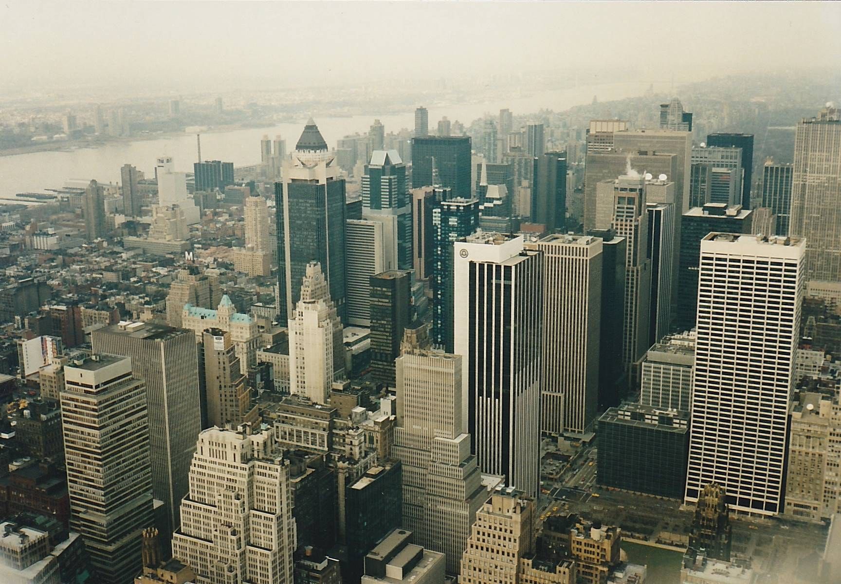 Lower Manhattan from the air in 1995 with the twin towers standing. A Wikimedia Commons photograph on Brent O'Mara Insights.