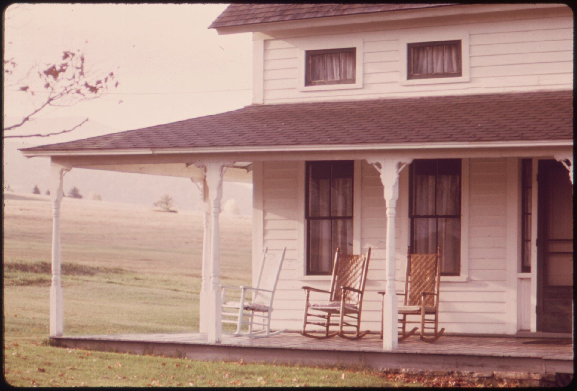 Empty rocking chairs on the porch of an old farmhouse. A Wikimedia Commons photograph on Brent O'Mara Insights.